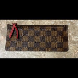 Louis Vuitton zippered change purse